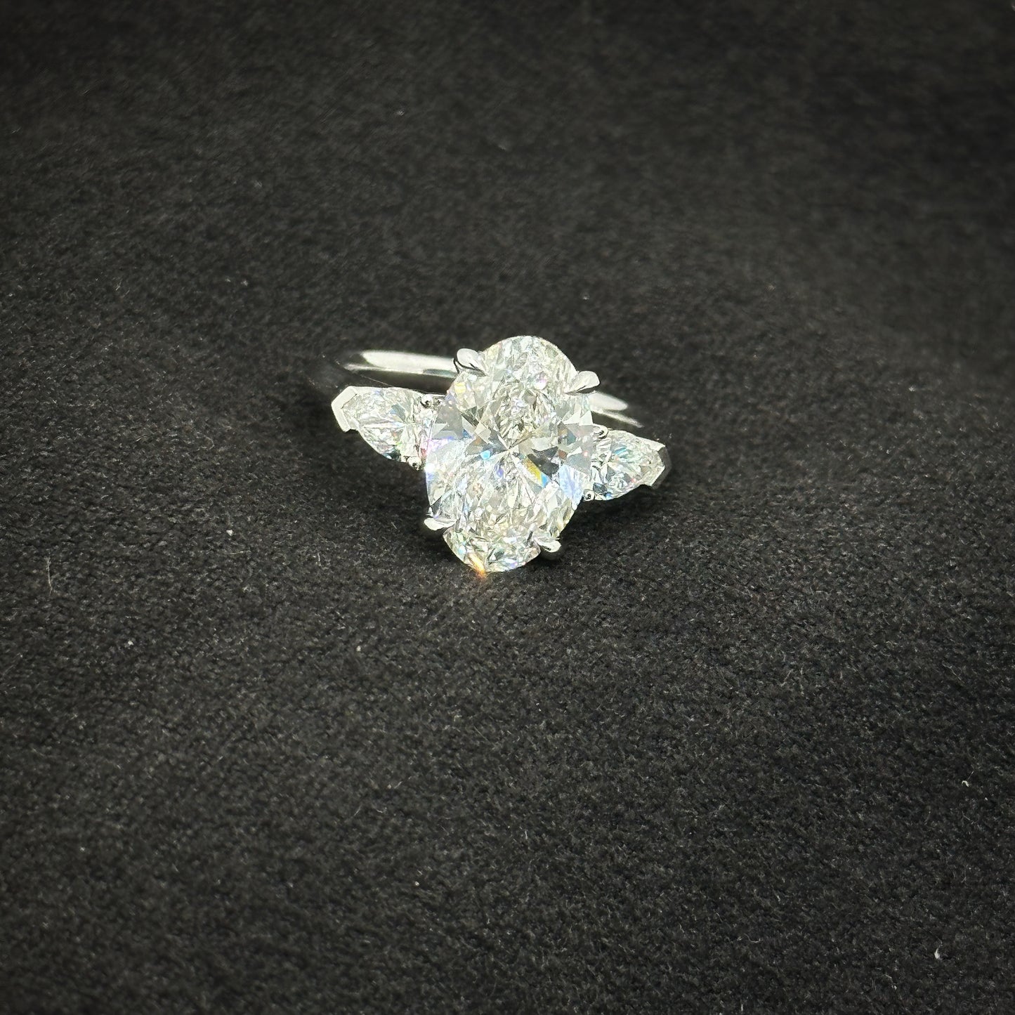 Oval shape, three stone ring
