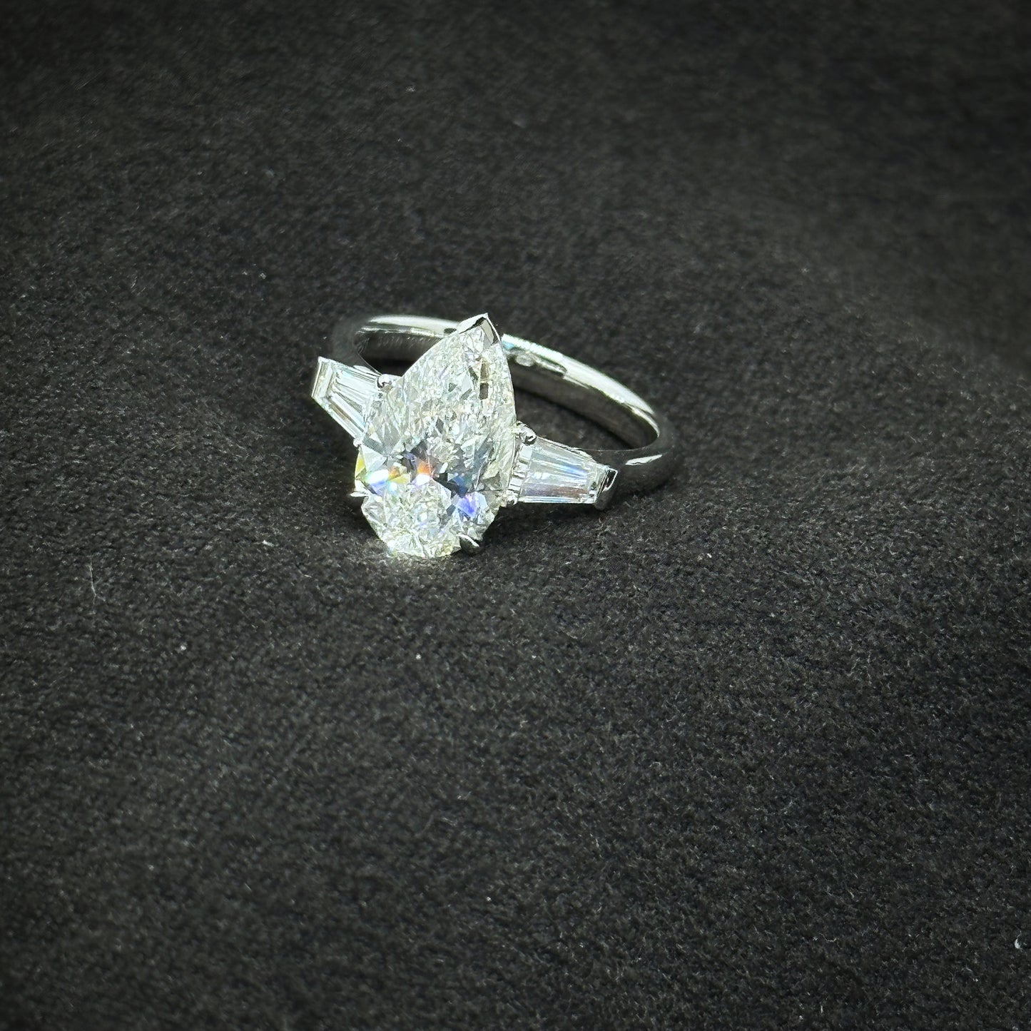 Pear shape, three stone ring