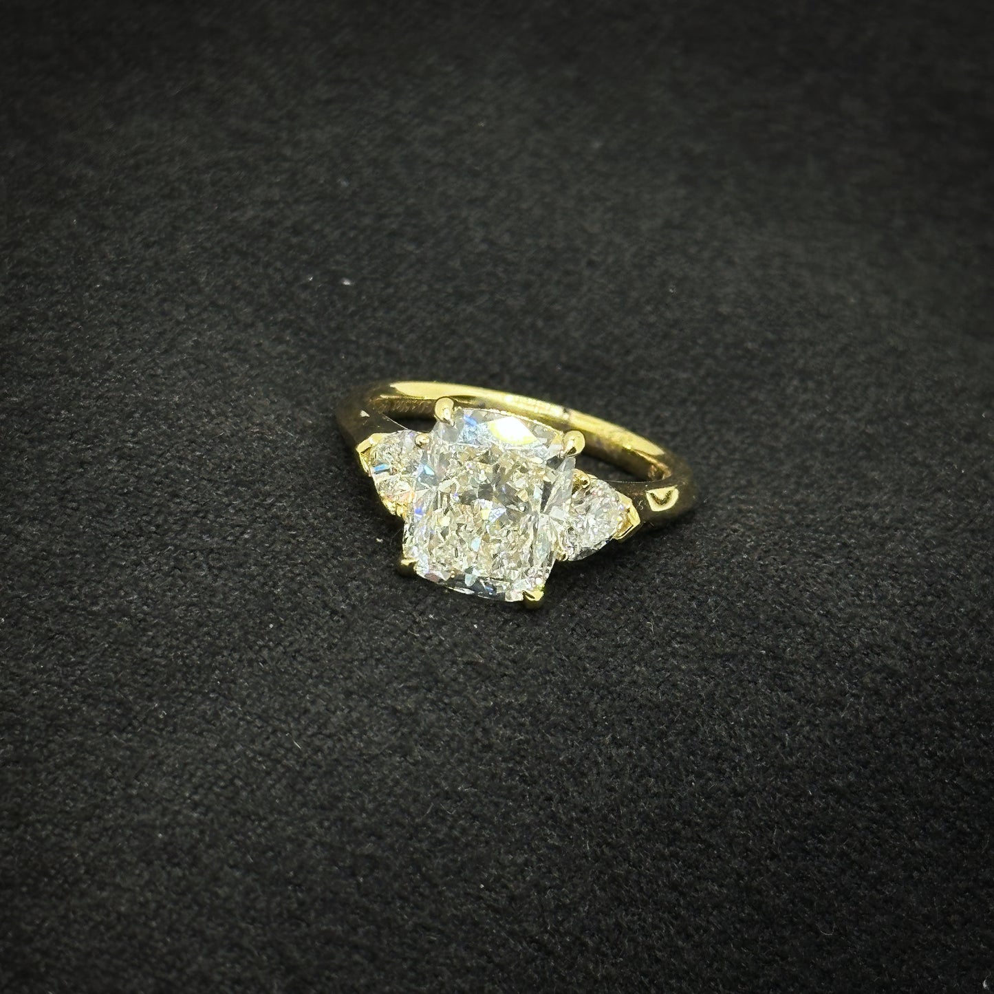 Radiant cut, three stone ring