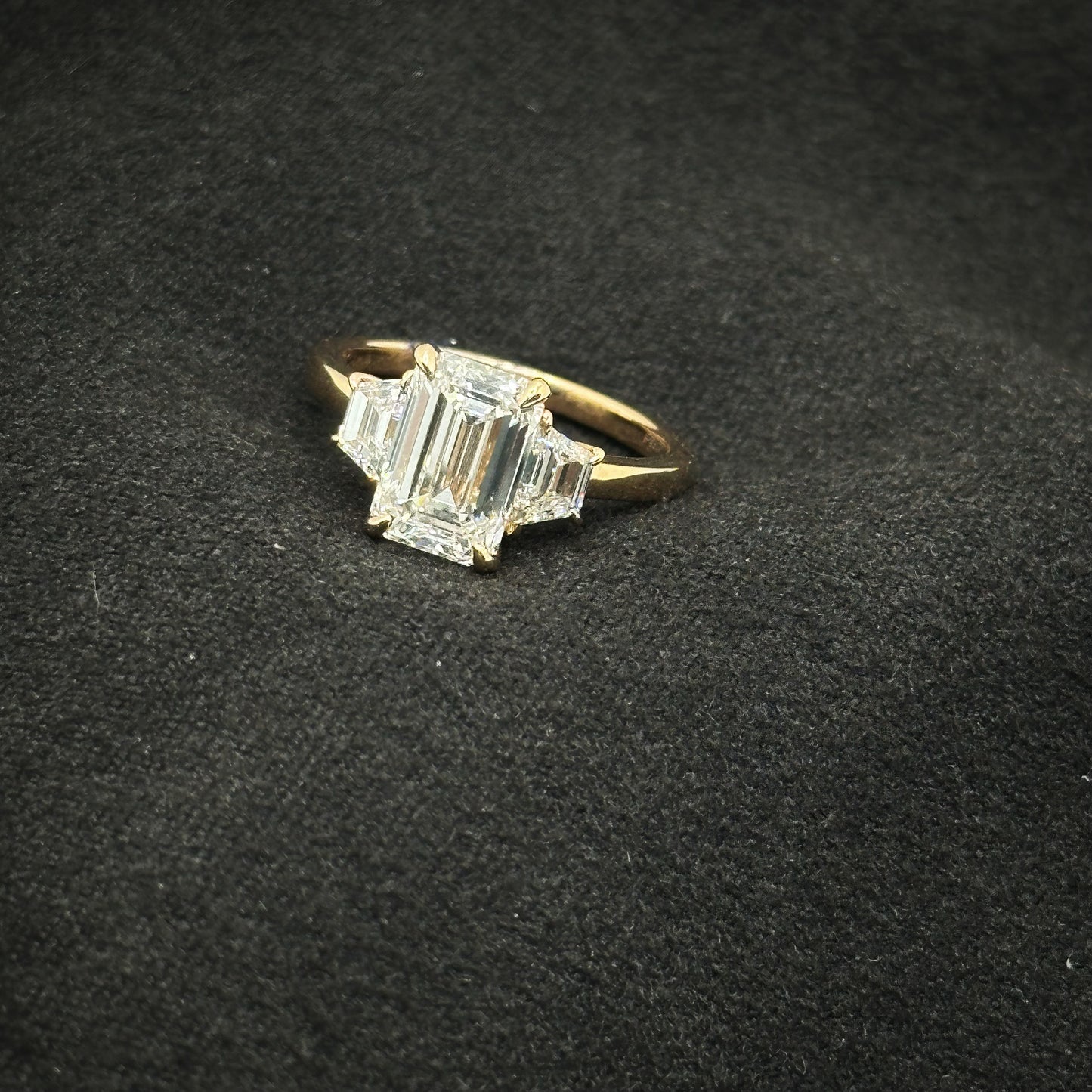 Emerald cut, three stone ring