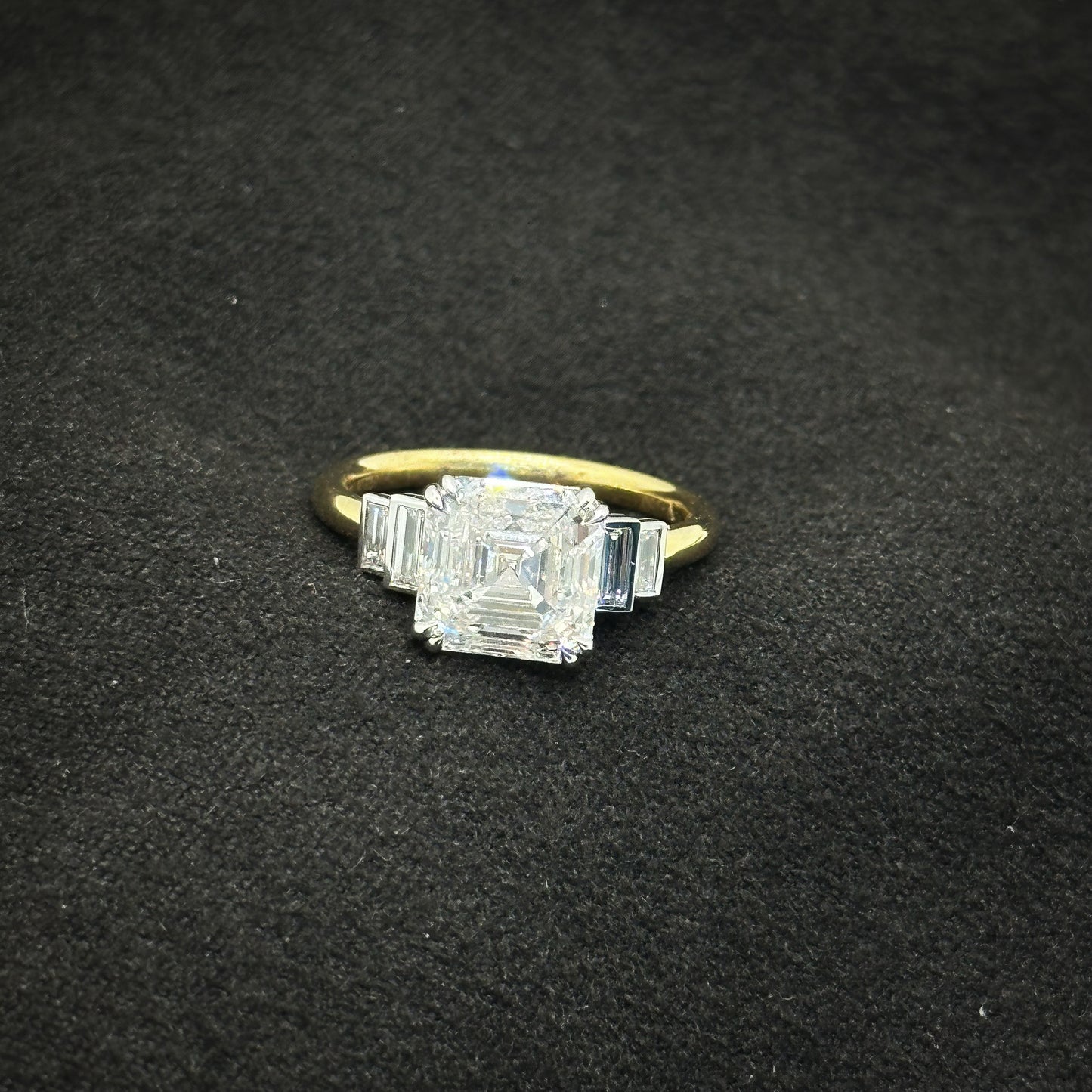 Princess cut, five stone ring
