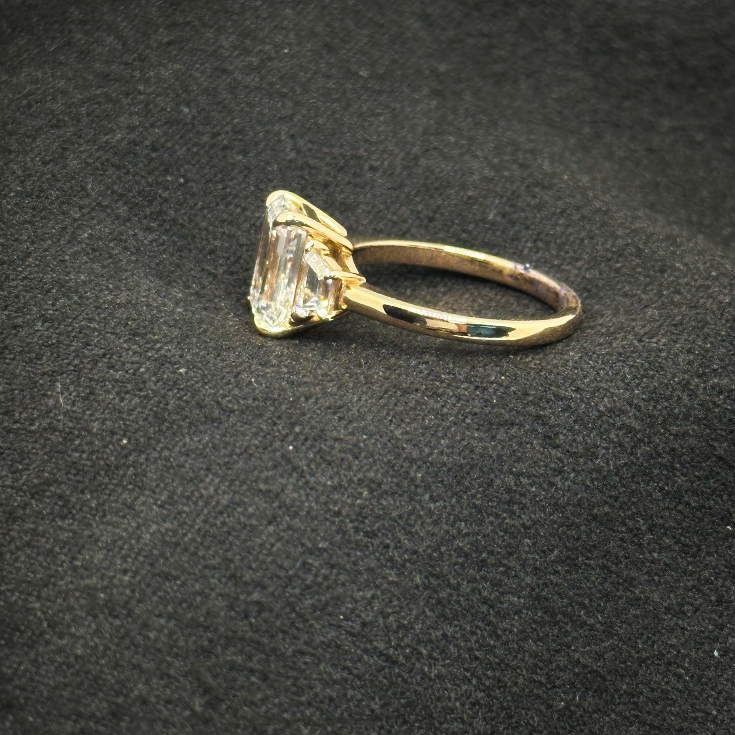 Emerald cut, three stone ring