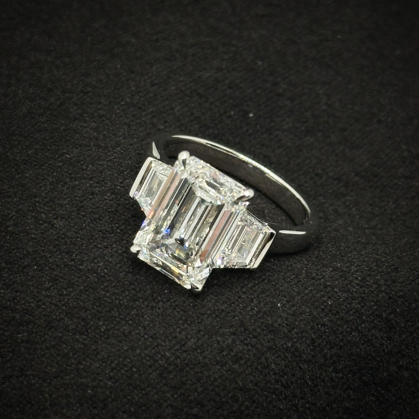 Emerald cut, three stone ring