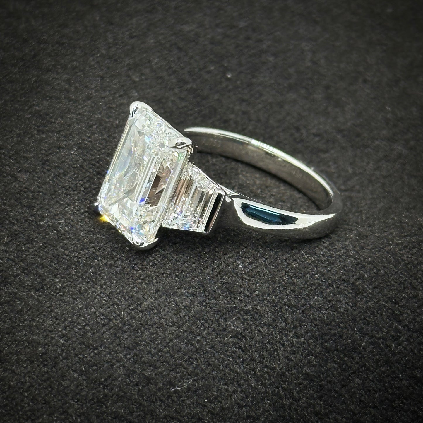 Emerald cut, three stone ring