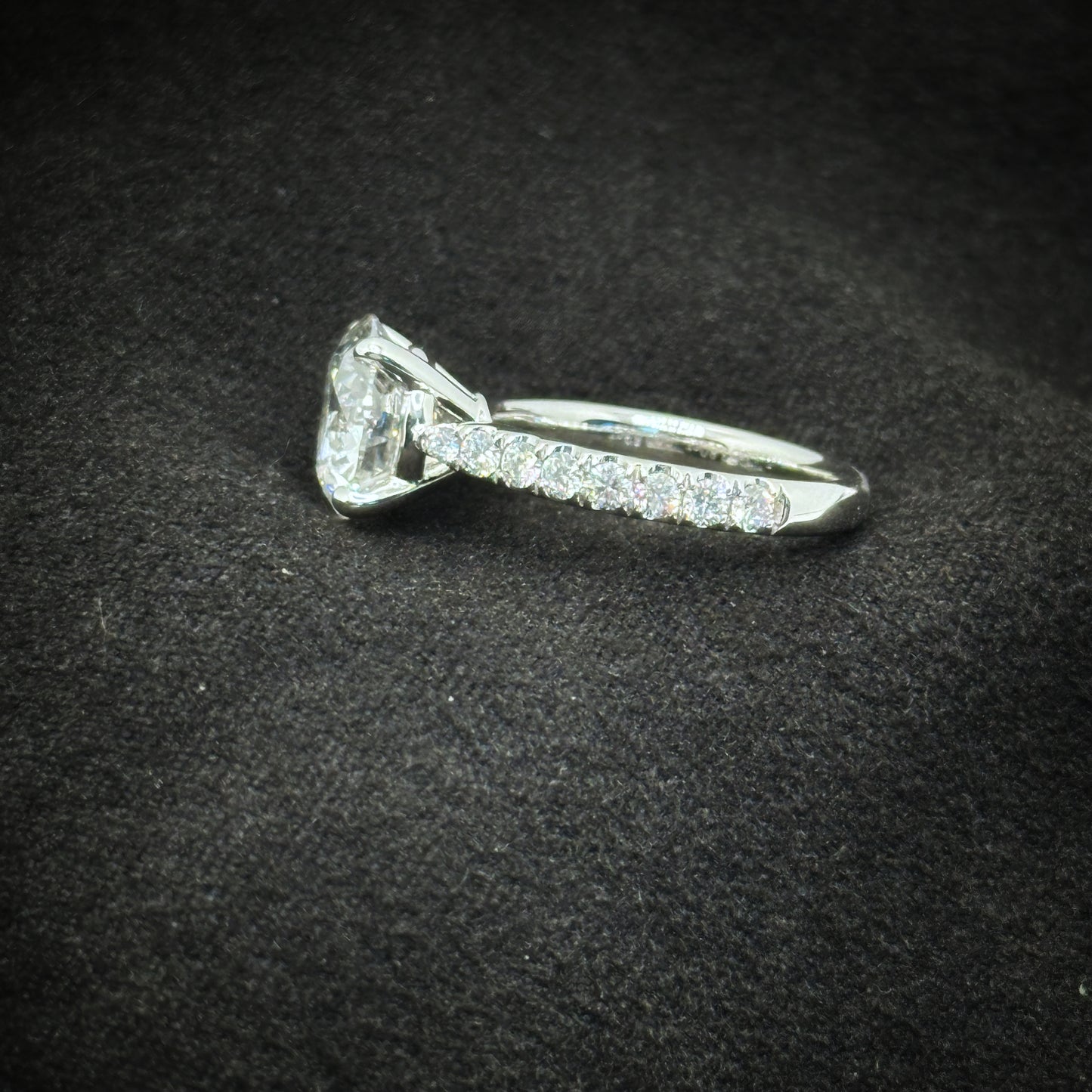 Round diamond, half pave band