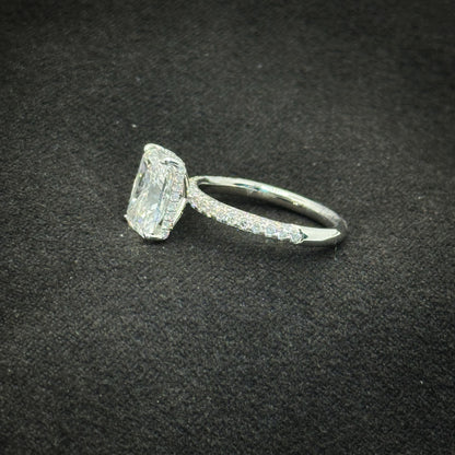 Radiant cut, half pave band